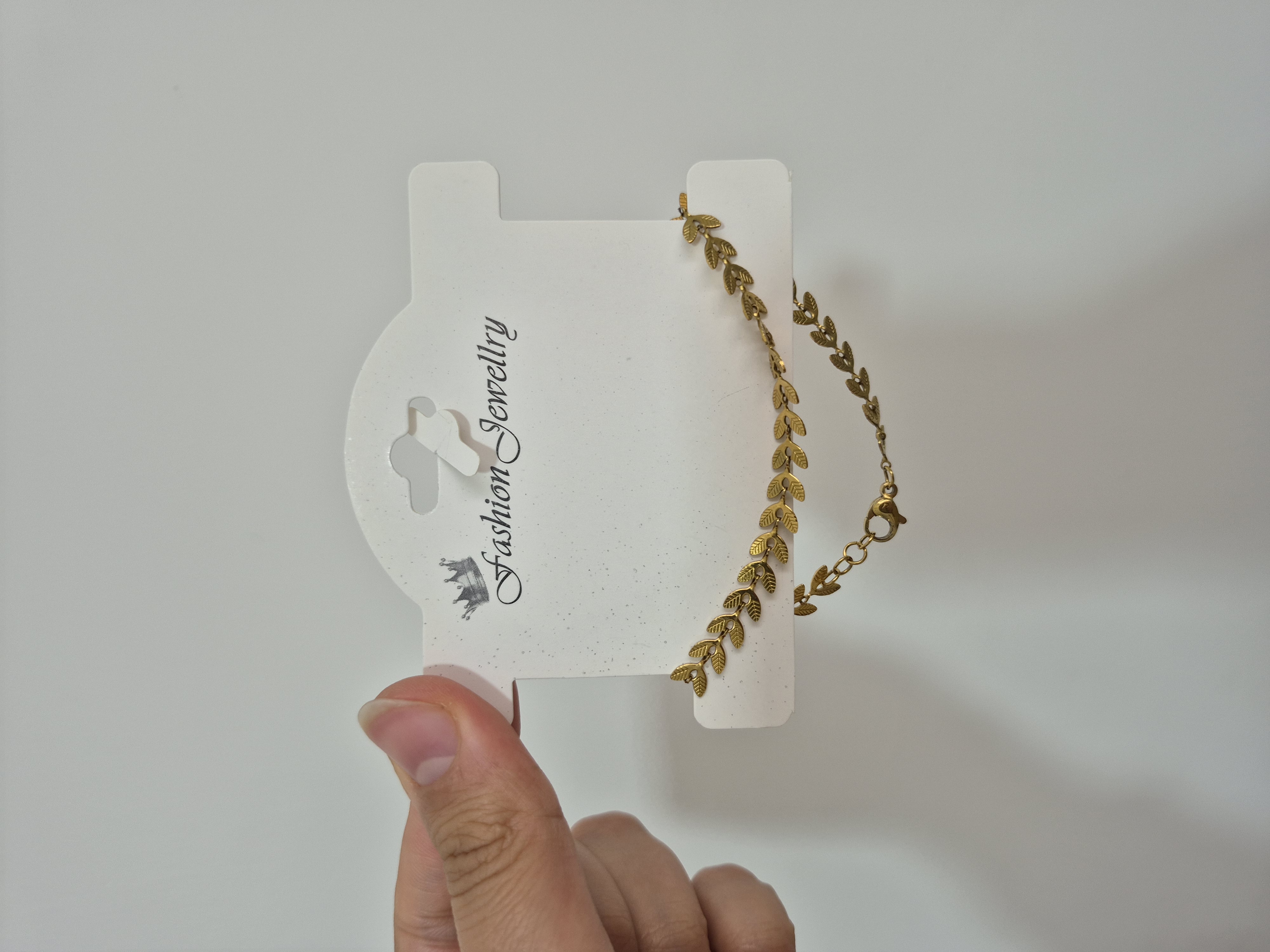 دستبند طرح برگ زنانه رنگ طلایی