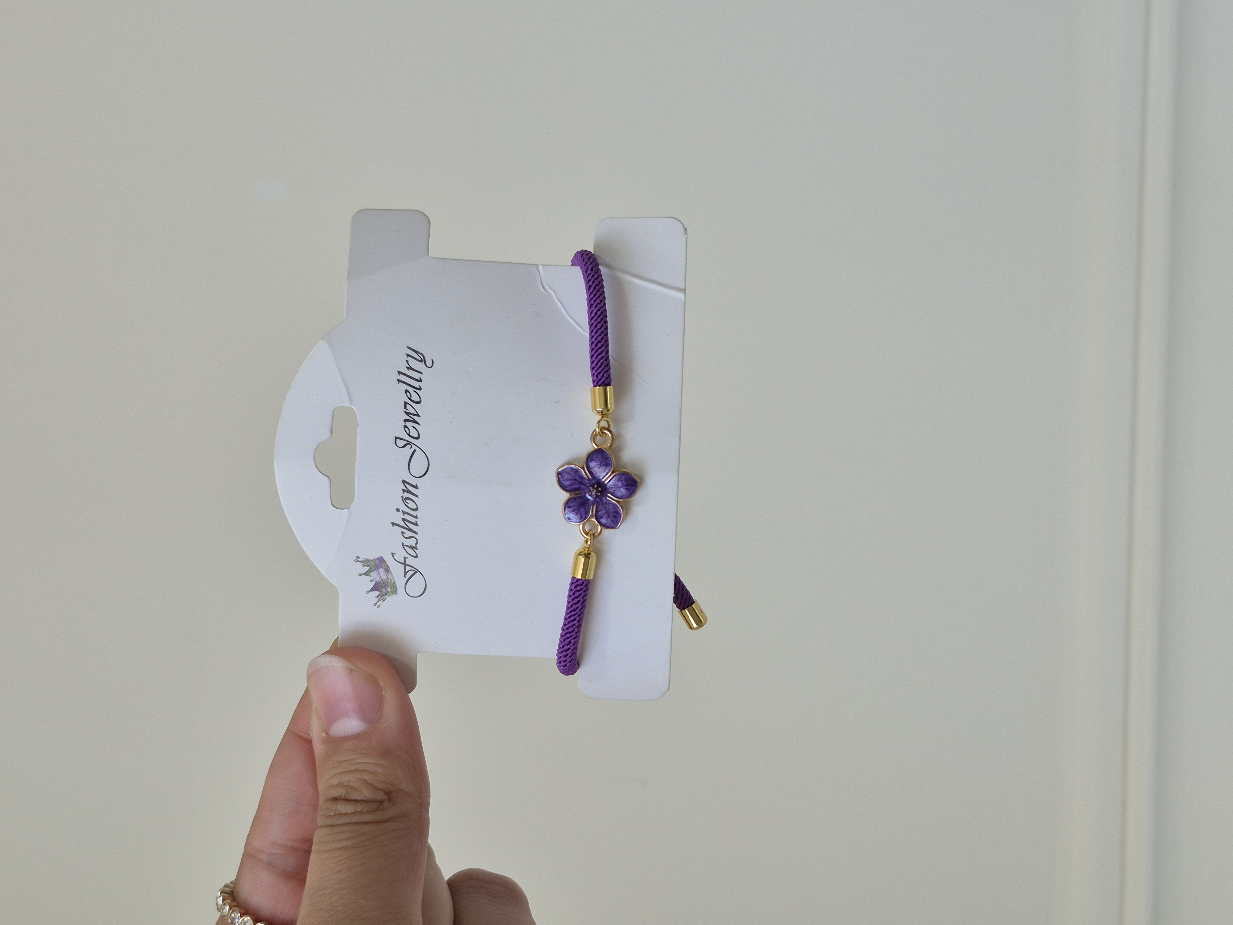 دستبند آسانسوری طرح گل بنفشه